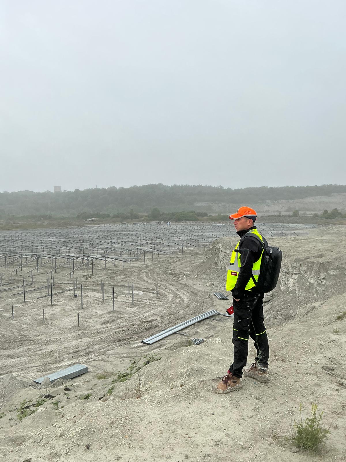 COH site engineer overlooking a solar park under construction